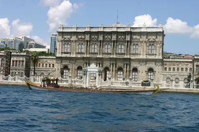 a boat in the water in front of a building at Hotel Erden Sarayevo in Istanbul