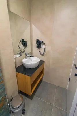 a bathroom with a sink and a toilet at Huzur Apart Hotel in Istanbul