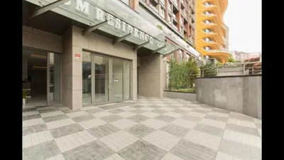 an outside view of a building with a tiled floor at CTS Elysium Residence Taksim in Istanbul
