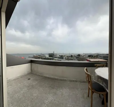 a view of a balcony with a table and chairs at Le Marde Hotel in Istanbul