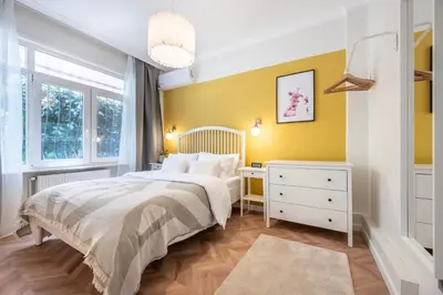 a bedroom with a bed and a desk and a window at Stay Beyond the Bosphorus #6 in Istanbul