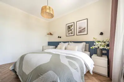 a bedroom with a bed with white and blue at Stay Beyond the Bosphorus #6 in Istanbul