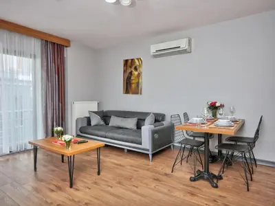 a living room with a couch and a table at Blueway Hotel Residence in Istanbul