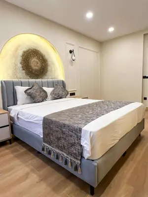 a bedroom with a large bed in a room at Tophane Mansion Karakoy in Istanbul