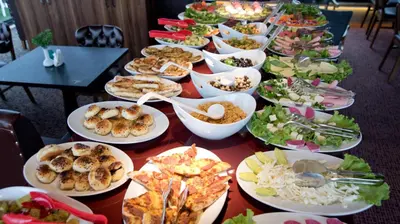 a long table with plates of food on it at Grand Ambiance Hotel in Istanbul