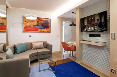 a living room with a couch and a table at Tango Arjaan by Rotana Istanbul Asia in Istanbul