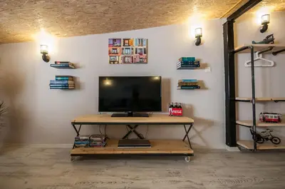 a television sitting on a table in a room at Newway Apartments in Istanbul