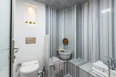a bathroom with a toilet and a sink at BAB - by Menar Hotel in Istanbul
