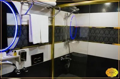 a bathroom with a shower and a sink at PALMYE HOTEL Beyoylu in Istanbul