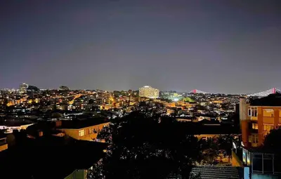 a view of a city at night at Akaretler City View between Nişantaşı and Beşiktaş in Istanbul
