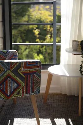 a room with a table and a chair and a window at Agion Living Taksim Cihangir in Istanbul