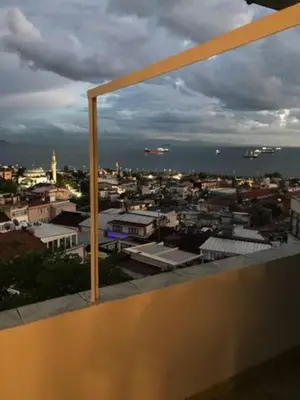 a view of a city from the balcony of a building at Bosphorus view, Great location and Cozy House! in Istanbul
