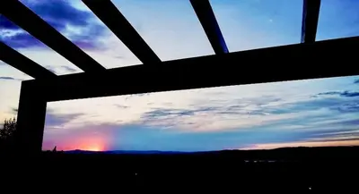 a view from a window of a sunset at Ada Villam in Sapanca