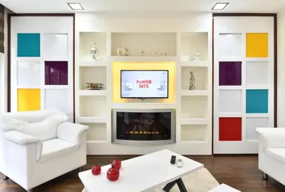 a living room with a fireplace and a tv at Castle Suite in Istanbul