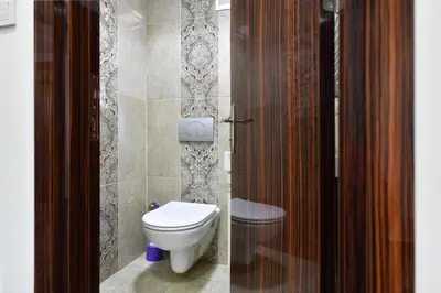 a bathroom with a toilet and a sink at Castle Suite in Istanbul