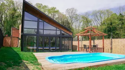 a house with a swimming pool and a gazebo at Backyard Sapanca in Sapanca