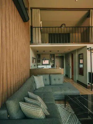 a living room with a couch with pillows at Casa Vera Villa in Sakarya