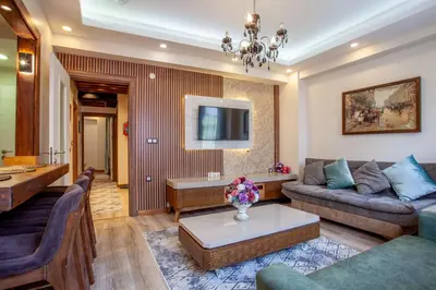 a living room with a couch and a table at Mutlu flat in Istanbul