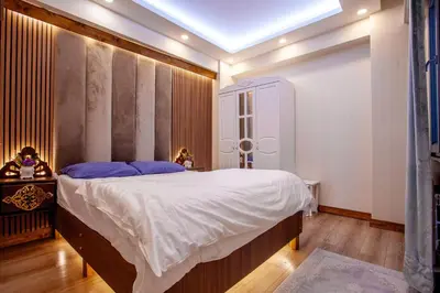 a bedroom with a large bed in a room at Mutlu flat in Istanbul