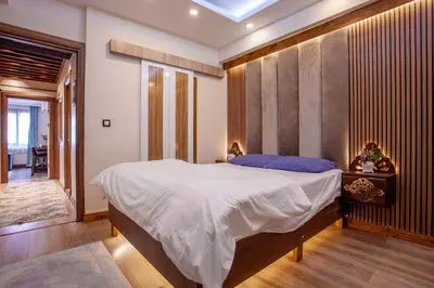 a bedroom with a large bed in a room at Super house 75 mt 2 bedrooms 1 living room Istanbul center in Istanbul