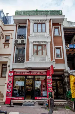 a store front of a building in a city at Super house 75 mt 2 bedrooms 1 living room Istanbul center in Istanbul