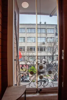 a window with a view of a building at Super house 75 mt 2 bedrooms 1 living room Istanbul center in Istanbul