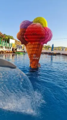 an ice cream cone in the water at a pool at Aydın Motel in Marmara