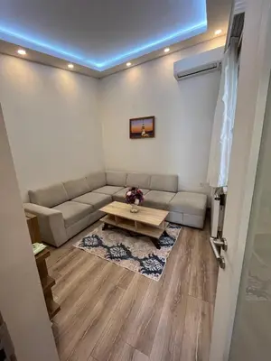 a living room with a couch and a table at Mutlu terrace in Istanbul