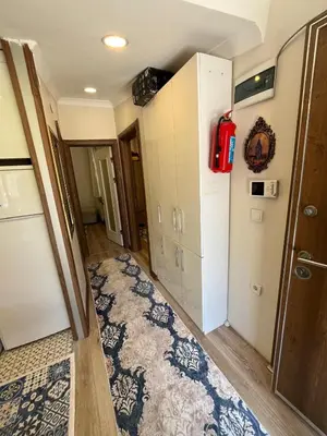 a room with a rug on the floor at Mutlu terrace in Istanbul