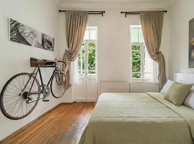a bike hanging on the wall of a bedroom at House of Soul & Triplex with a Winter Garden in Istanbul