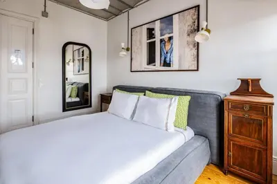 a bedroom with a bed and a couch at Stunning New Balat Water Front Pad! #383 in Istanbul