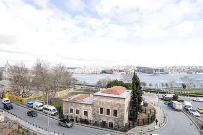 an aerial view of a city with cars parked on a road at Stunning New Balat Water Front Pad! #383 in Istanbul