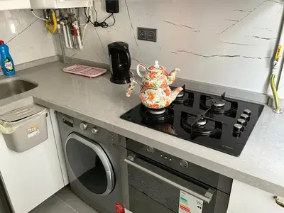 a tea pot sitting on a stove in a kitchen at Three-room private apartment in Beyoğlu, Central Istanbul in Istanbul