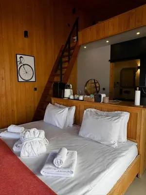 a bedroom with a bed with towels on it at Prime Suites in Kadıköy