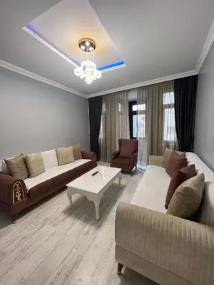 a living room with two couches and a table at TAKSİM CMLM Suit in Istanbul