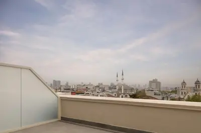 a view of the city from the roof of a building at Moxy Istanbul Taksim in Istanbul