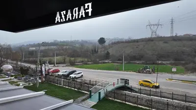 a view of a parking lot with cars on a road at farazarooms in Serdivan