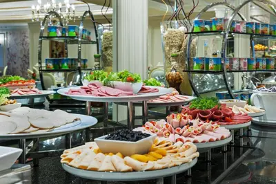 a buffet with many plates of food on a table at Elite World Istanbul Taksim in Istanbul