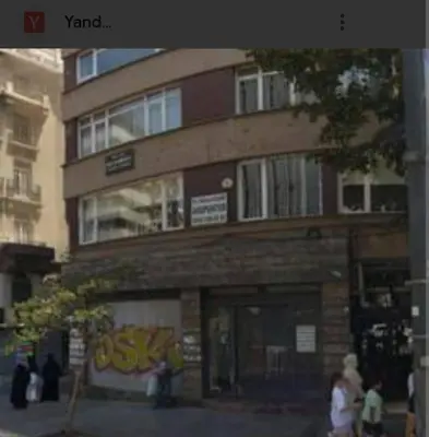 a building with people standing in front of it at City Center Suite in Istanbul