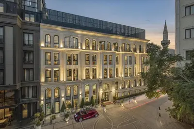 a building with a red car parked in front of it at The Ritus Hotel Istanbul Sultanahmet, Tapestry Collection by Hilton in Istanbul