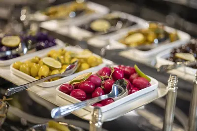 a buffet filled with different types of fruits and vegetables at The Ritus Hotel Istanbul Sultanahmet, Tapestry Collection by Hilton in Istanbul