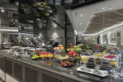 a buffet line with many different types of food at The Ritus Hotel Istanbul Sultanahmet, Tapestry Collection by Hilton in Istanbul
