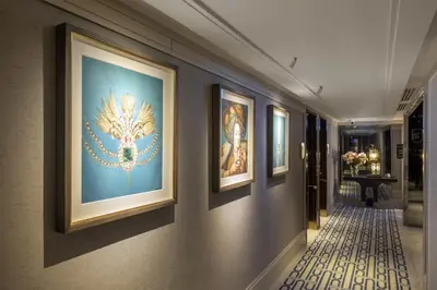 a hallway with paintings on the walls of a hotel at The Ritus Hotel Istanbul Sultanahmet, Tapestry Collection by Hilton in Istanbul