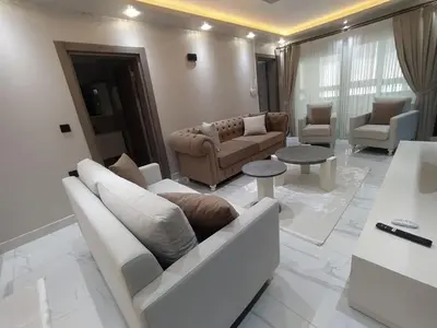 a living room with a couch and a table at Daly Resort 1 in Sapanca