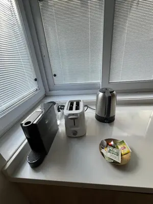 a kitchen counter with a toaster and a toaster at Lobby No23 in Istanbul