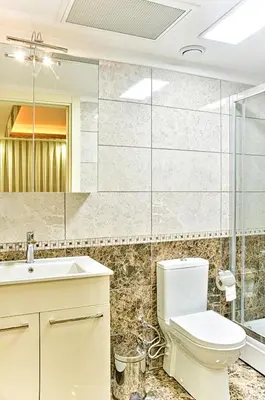 a bathroom with a toilet and a sink at Best Fulya Suites in Istanbul