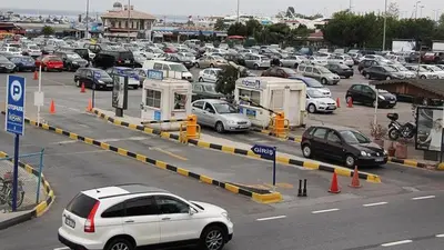 a parking lot filled with lots of parked cars at Grafen Hotel in Istanbul