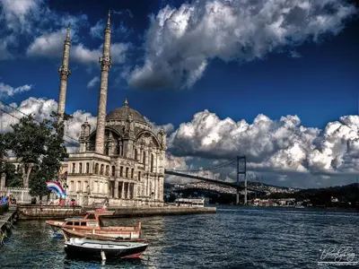 a large building with two tall towers and a bridge at Grafen Hotel in Istanbul
