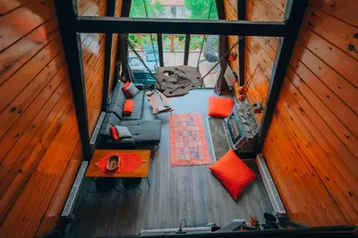 an overhead view of a living room with a couch at Sakarya Sapanca Memnuniye de 3 Oda1 salon Özel Havuzlu-Jakuzili-Şömineli-Korunaklı 8 Kişilik Bungalov in Sapanca