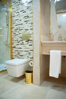 a bathroom with a tub and a toilet and a sink at Arden City Hotel-Special Category in Istanbul